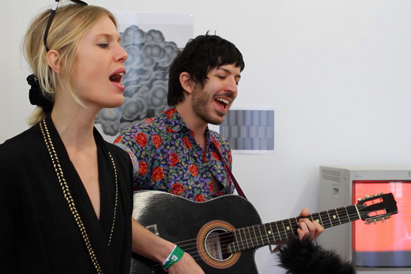 Ex Cops performs for a video shoot at Farewell Books in Austin, Texas during South By Southwest on March 15, 2013.